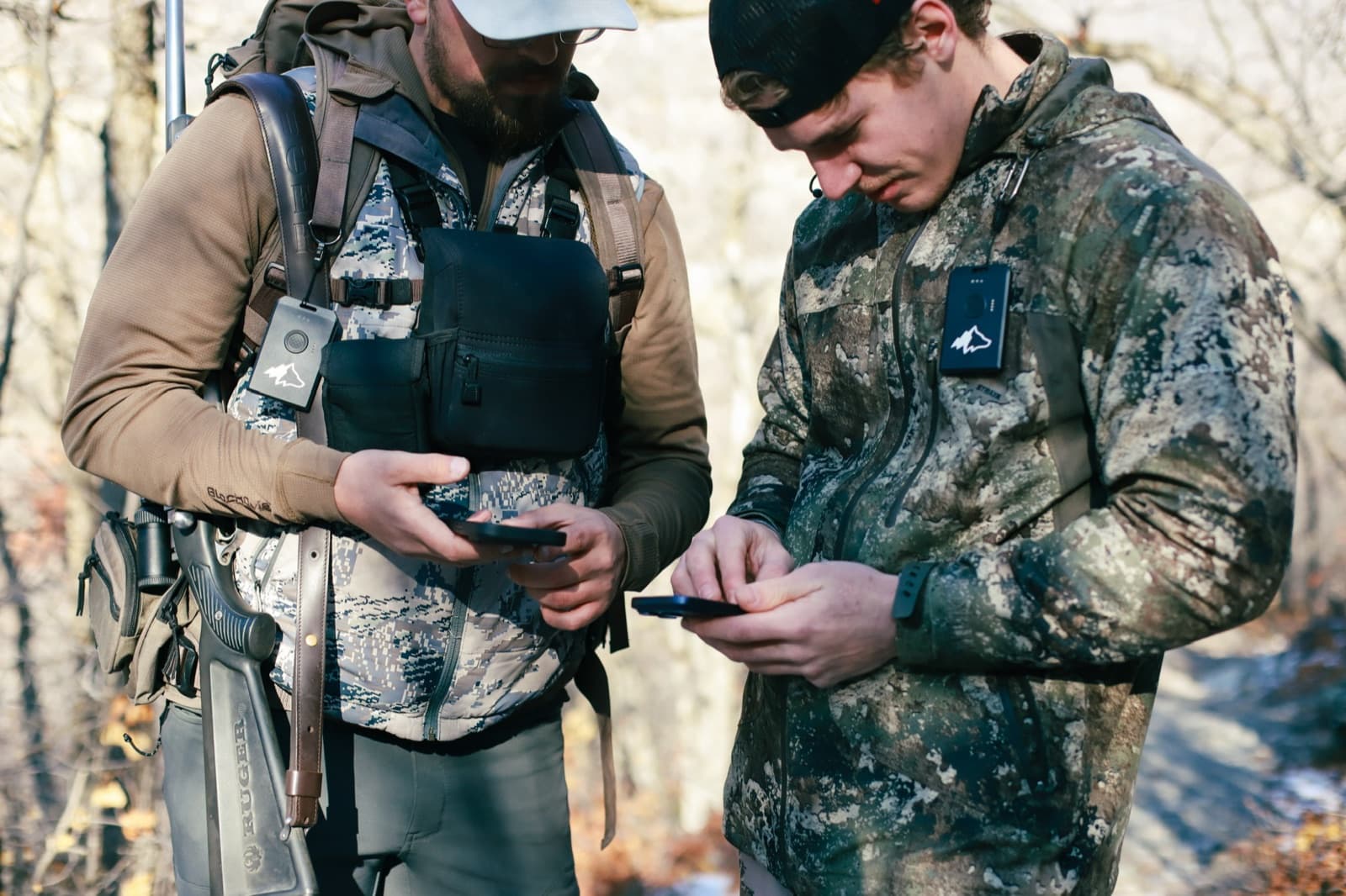 Two hunters checking the Kiba Go map on their phones